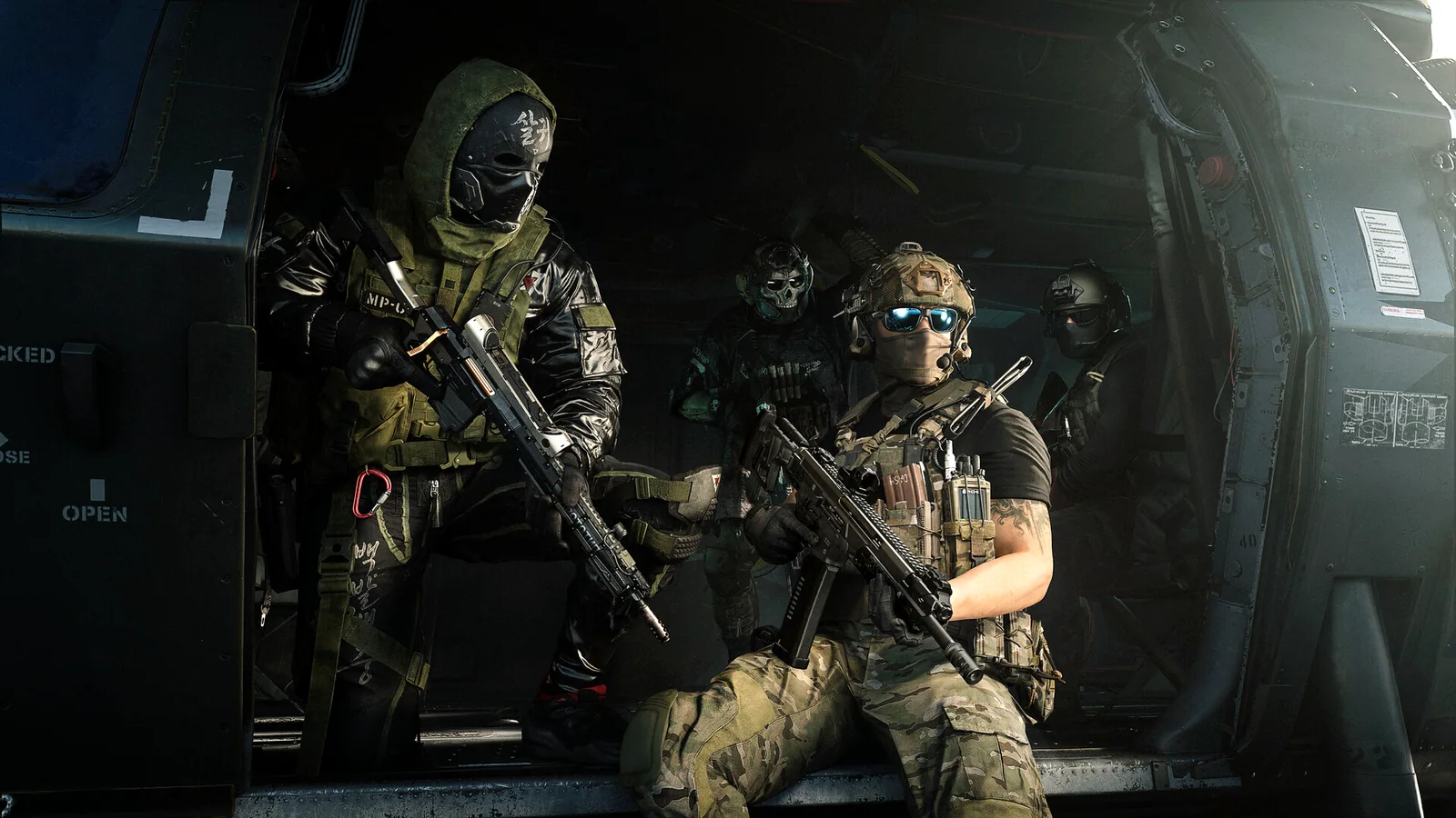 Masked soldiers riding inside a troop aircraft